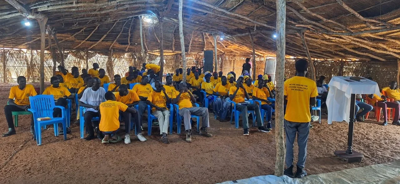 Community members attending a ministry gathering